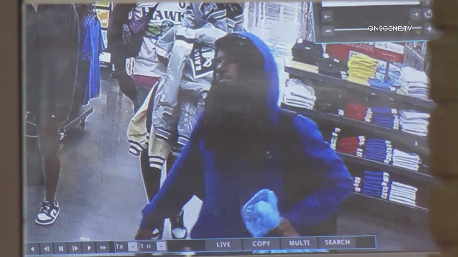 8 suspects caught on camera stealing thousands of dollars in merchandise from shoe store