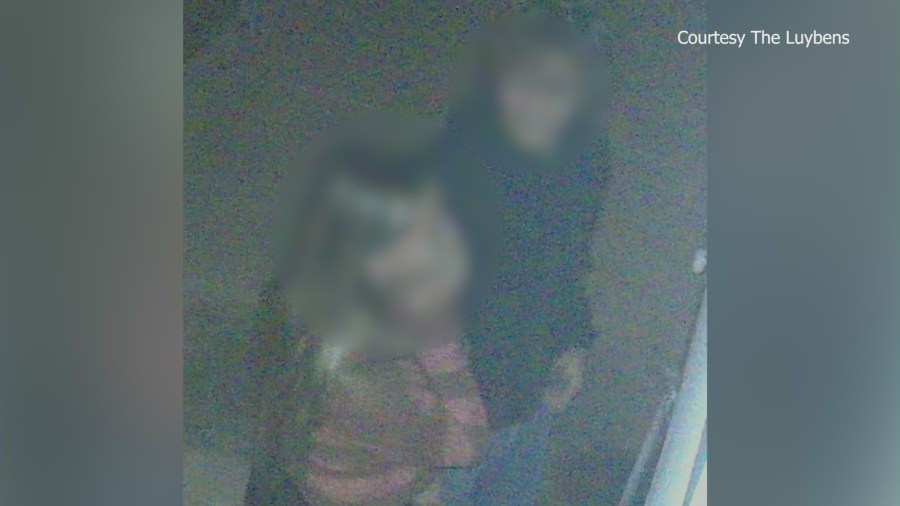 A Southern California couple remains shaken up after a video shows two people trying to enter their home and watching them while they sleep. (Luyben Family)