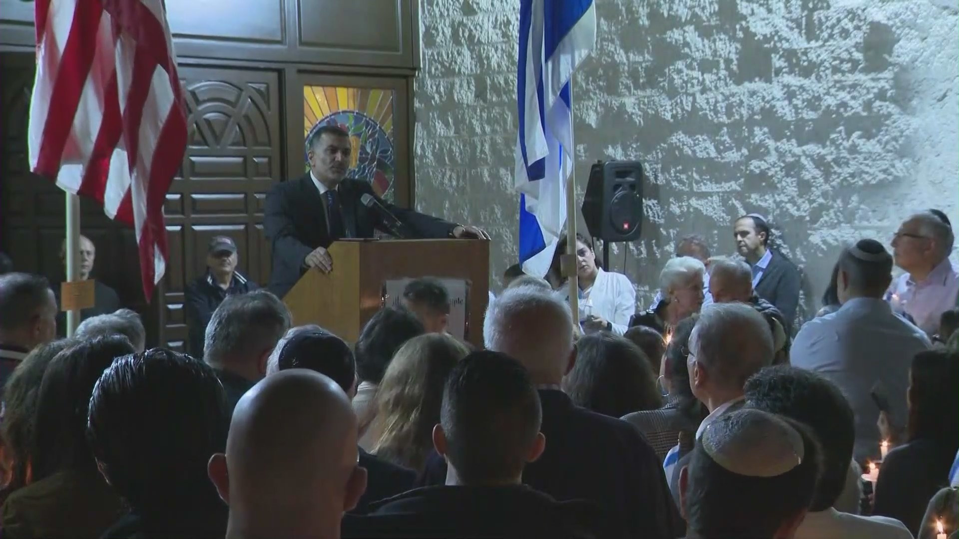Hundreds gathered for a candlelight vigil at the Sephardic Temple Tifereth Israel in Westwood on Oct. 10, 2023, standing in solidarity with the innocent lives lost in the Israel-Palestinian war. (KTLA)