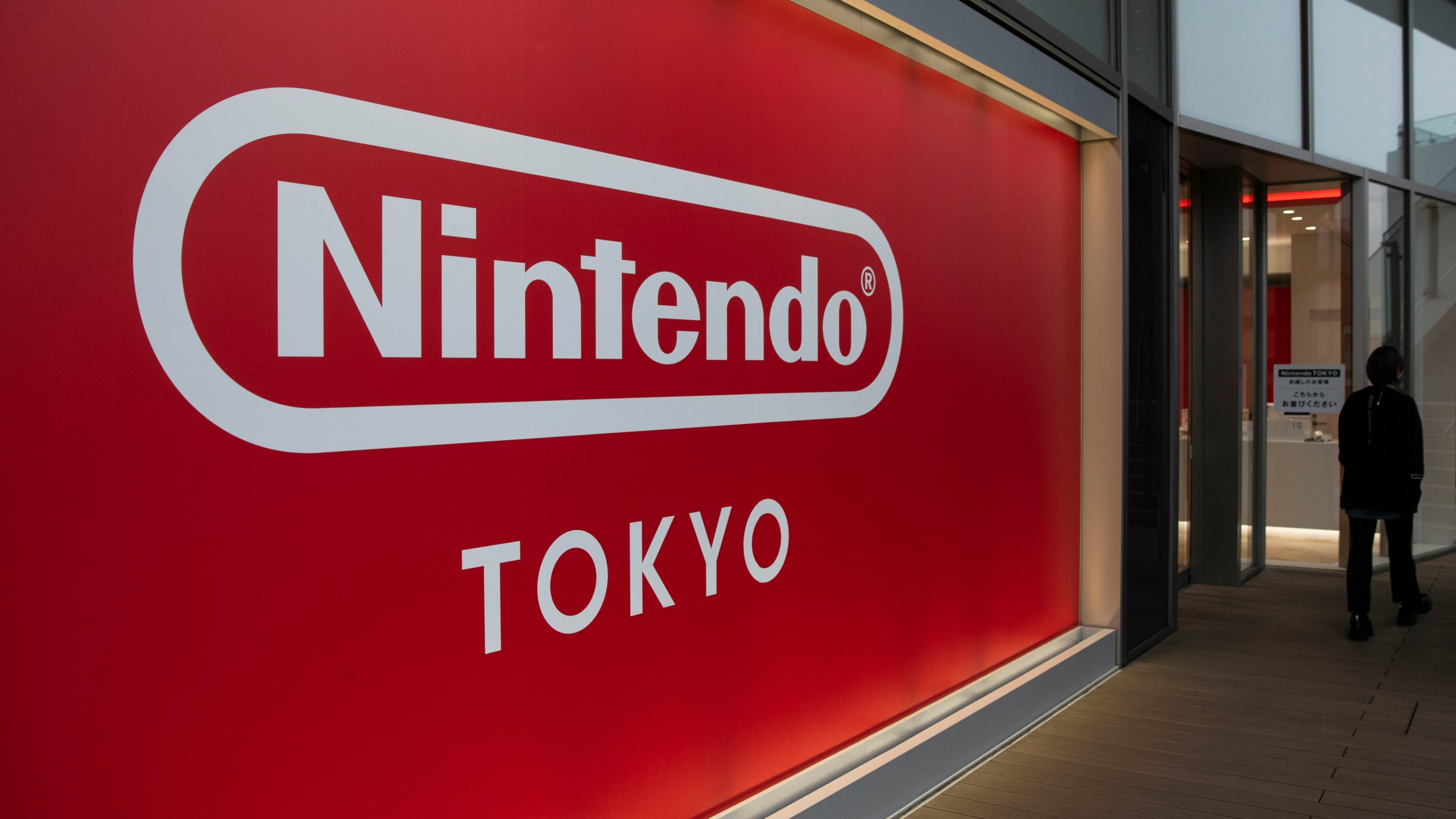 FILE - A Nintendo sign is seen outside Nintendo's official store in the Shibuya district of Tokyo, Thursday, Jan. 23, 2020. Nintendo reported an 18% rise in net profit for the first fiscal half on Tuesday, Nov. 7, 2023, as sales continued to get a boost from its hit Super Mario movie, as well as the popularity of various new video game software.(AP Photo/Jae C. Hong)