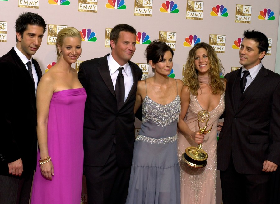 FILE - David Schwimmer, from left, Lisa Kudrow, Matthew Perry, Courteney Cox, Jennifer Aniston and Matt LeBlanc pose after "Friends" won outstanding comedy series at the 54th Primetime Emmy Awards on Sept. 22, 2002, in Los Angeles. Cast members are sharing more remembrances of Perry in their first personal social media posts since the actor’s death on Oct. 28. (AP Photo/Reed Saxon, File)