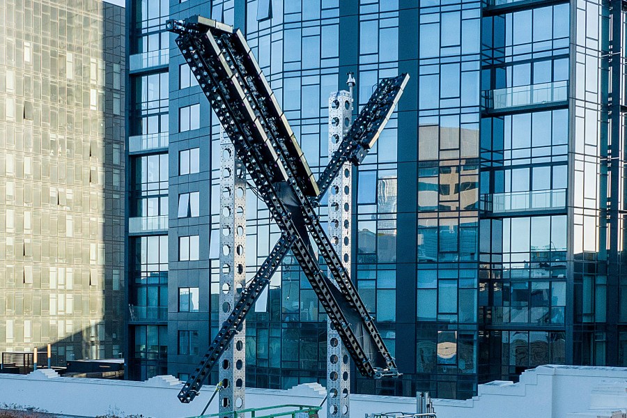 File - An "X" sign sits atop the social media platform's headquarters, in San Francisco, on July 28, 2023. IBM has stopped advertising on X after a report said its ads were appearing alongside material praising Adolf Hitler and Nazis. (AP Photo/Noah Berger, File)