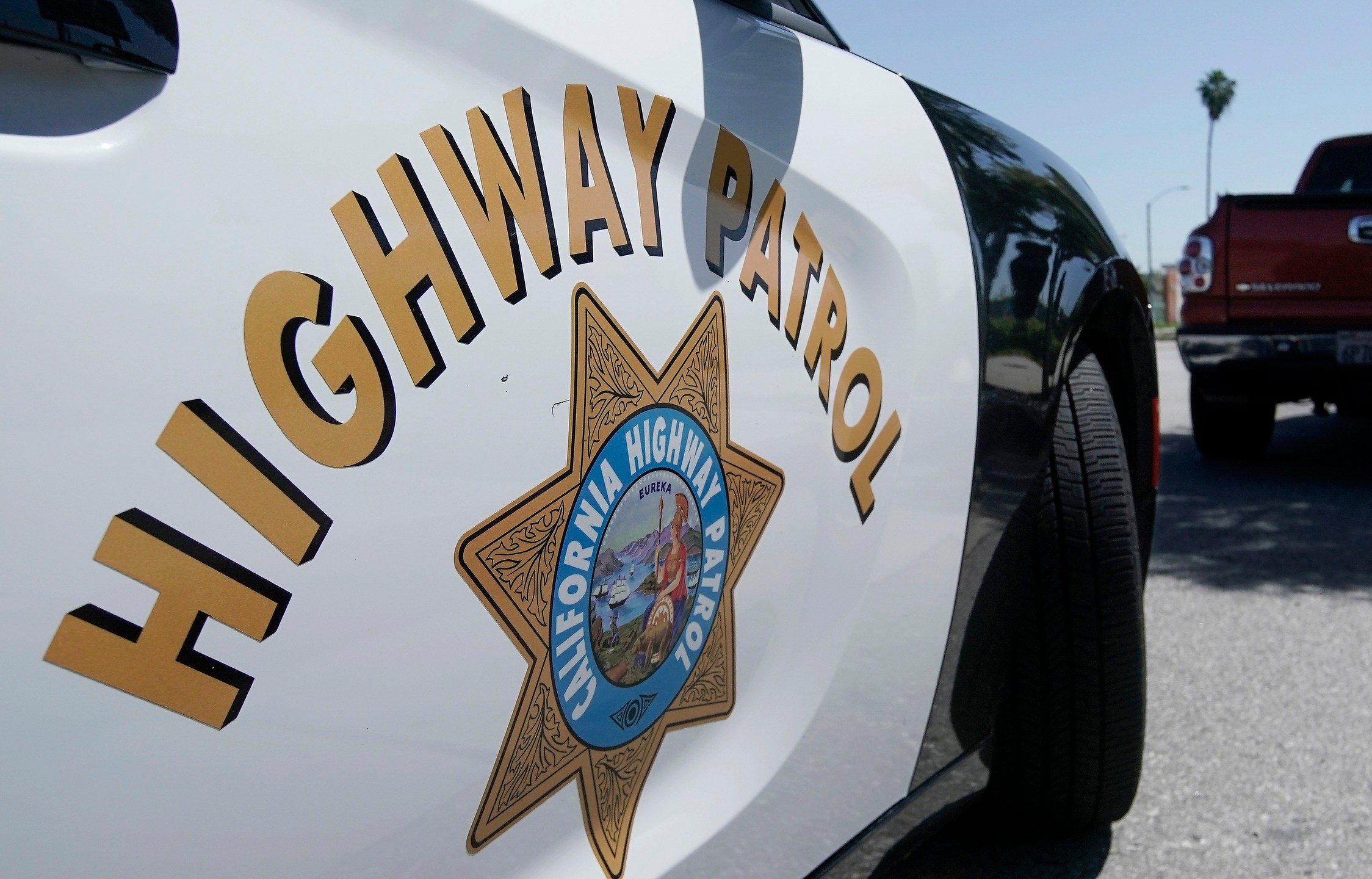 FILE - A California Highway Patrol officer stops a motorist in Anaheim, Calif., April 23, 2020. State authorities were investigating Monday, Nov. 20, 2023, after a California Highway Patrol officer shot and killed a man on a Los Angeles area freeway during a struggle over the weekend that was recorded on video. (AP Photo/Chris Carlson, File)