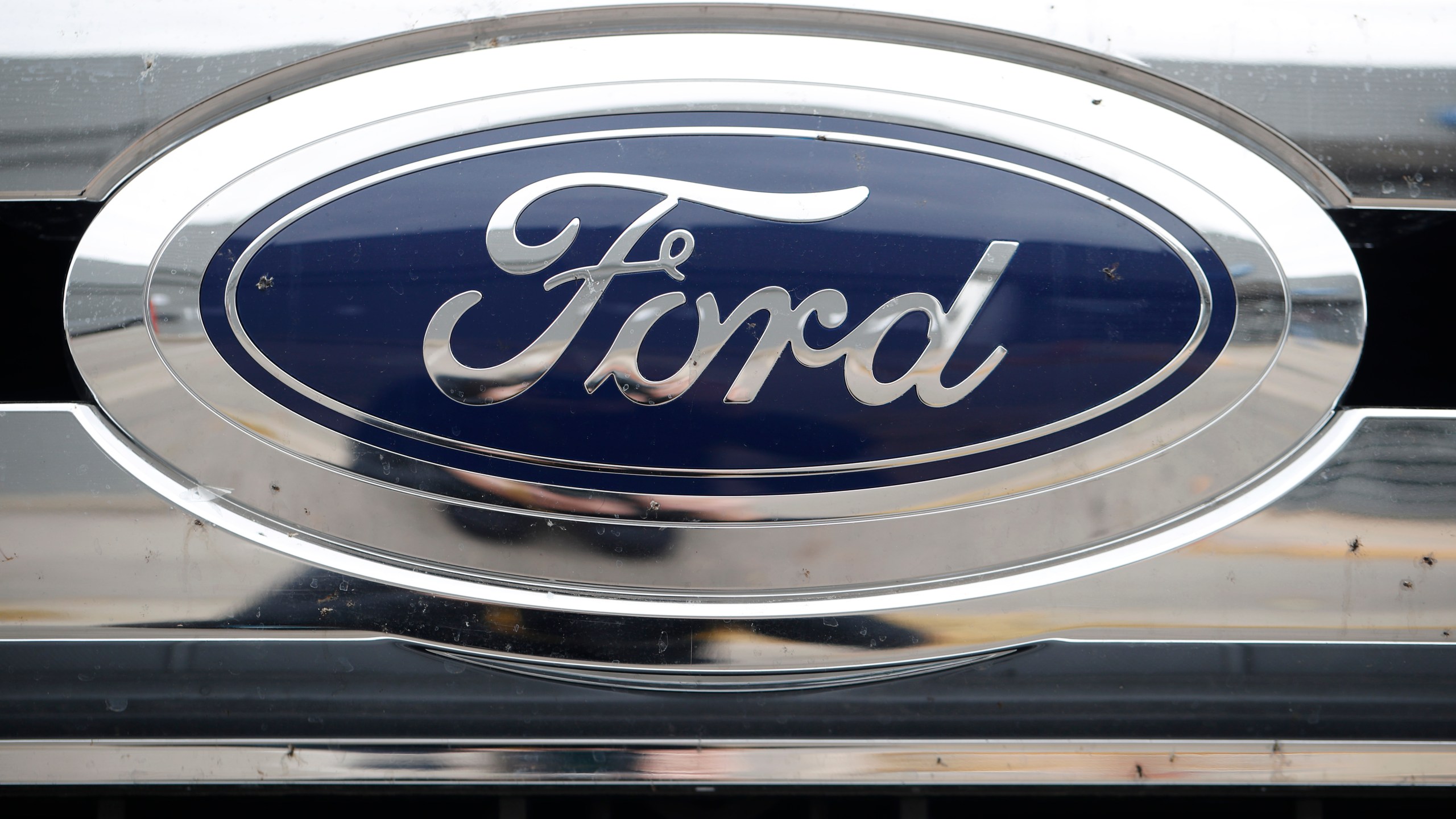 This Oct. 20, 2019 file photo shows the Ford company logo at a Ford dealership in Littleton, Colo.