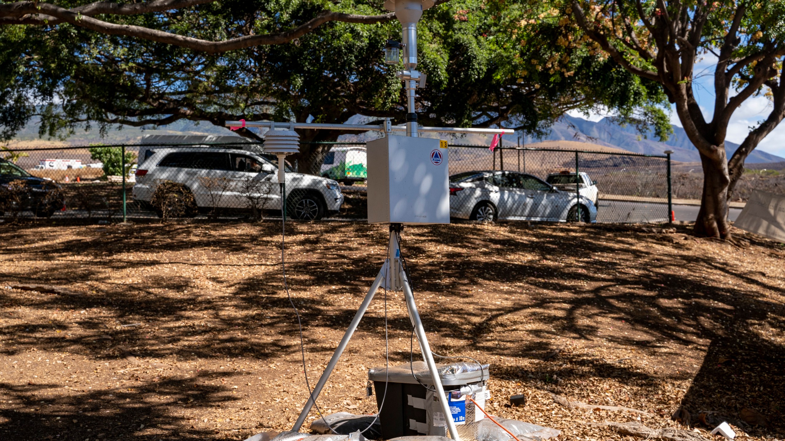 An air quality monitoring sensor is seen at Lahaina Comprehensive Health Center on Friday, Nov. 3, 2023, in Lahaina, Hawaii. Hawaii Department of Health and Environmental Protection Agency installed dozens of PM2.5 sensors in Lahaina and Upcountry Maui following the wildfire. (AP Photo/Mengshin Lin)