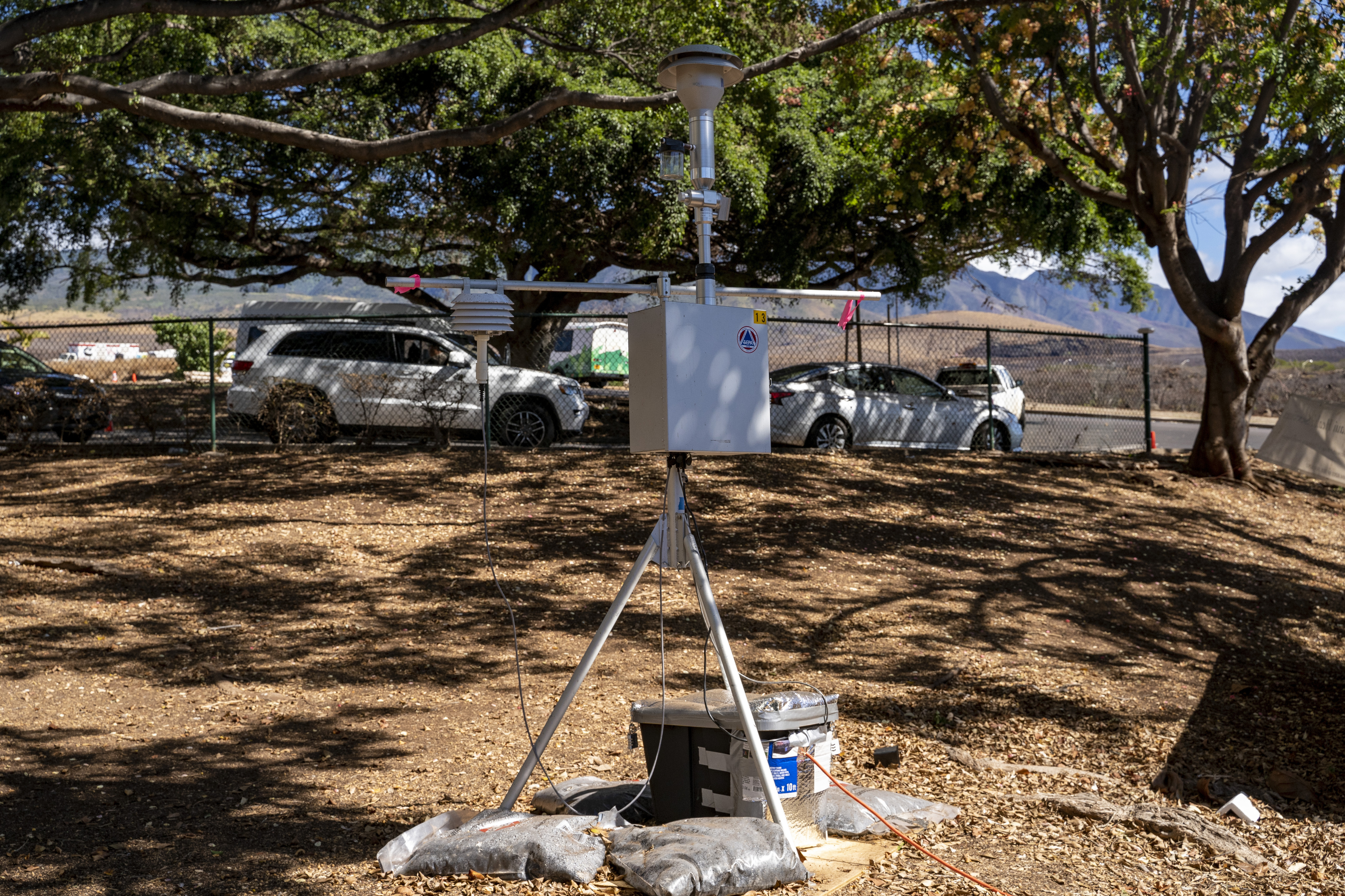 An air quality monitoring sensor is seen at Lahaina Comprehensive Health Center on Friday, Nov. 3, 2023, in Lahaina, Hawaii. Hawaii Department of Health and Environmental Protection Agency installed dozens of PM2.5 sensors in Lahaina and Upcountry Maui following the wildfire. (AP Photo/Mengshin Lin)