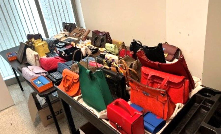 A woman was arrested for allegedly operating a crime fence that involved stolen luxury handbags throughout Southern California. (Los Angeles Police Department)