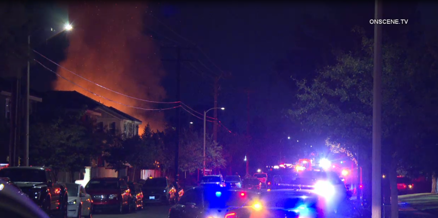 Home erupts into flames after hours-long standoff