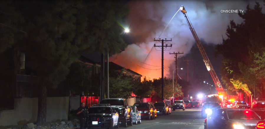 Home erupts into flames after hours-long standoff