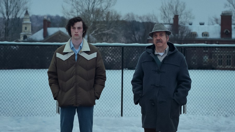 (L-R): Dominic Sessa stars as Angus Tully and Paul Giamatti as Paul Hunham in director Alexander Payne’s THE HOLDOVERS, a Focus Features release. (Courtesy of FOCUS FEATURES/© 2023 FOCUS FEATURES LLC)