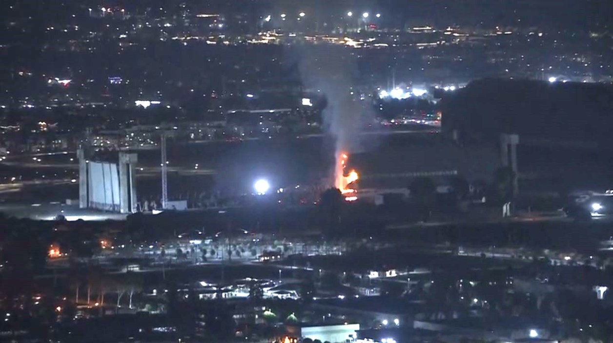 A second flare-up reignites at a historic WWII-era hangar in Tustin on Nov. 14, 2023. (KTLA)