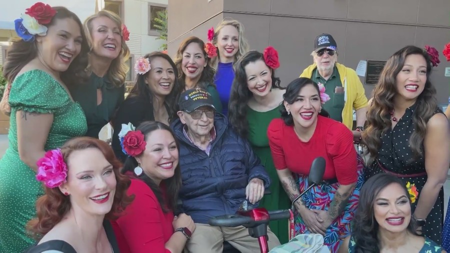 A group of female veterans with Pin-Ups for Vets, dressed up as WWII-style pin-up models while giving back to the community on Veteran’s Day on Nov. 11, 2023. (KTLA)