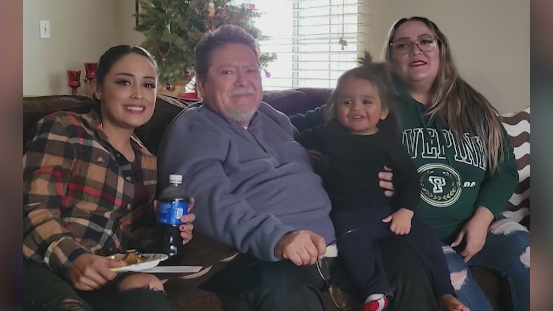 Michael Rangel with his children and grandchildren in a family photo.