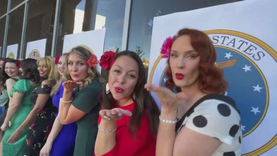 A group of female veterans with Pin-Ups for Vets, dressed up as WWII-style pin-up models while giving back to the community on Veteran’s Day on Nov. 11, 2023. (KTLA)