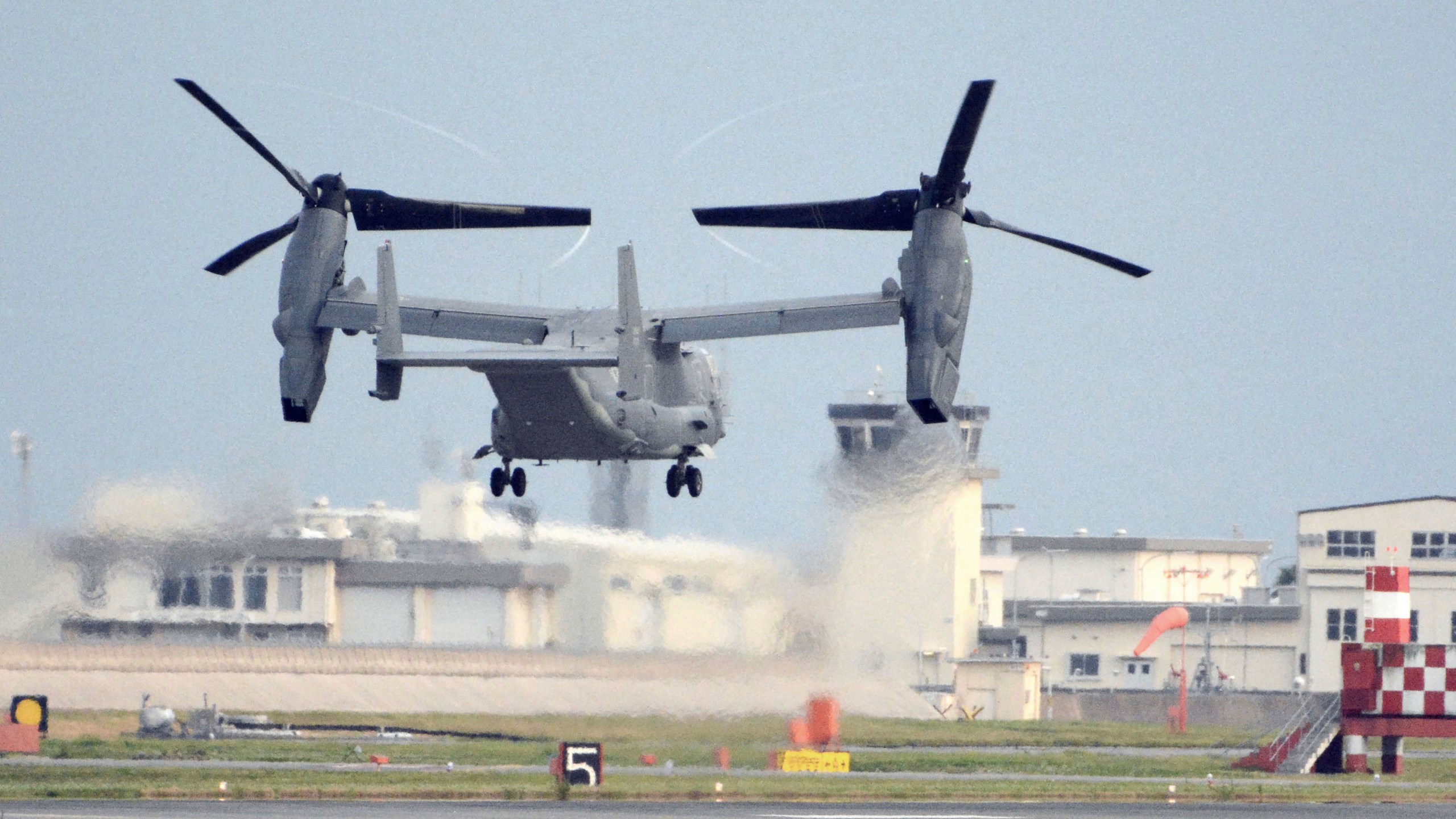 FILE - A U.S. military CV-22 Osprey takes off from Iwakuni base, Yamaguchi prefecture, western Japan, on July 4, 2018. Japanese and American military divers have spotted what could be the remains of a U.S. Air Force Osprey aircraft that crashed last week off southwestern Japan and several of the six crewmembers who are still missing, local media reported Monday, Dec. 4, 2023. (Kyodo News via AP, File)