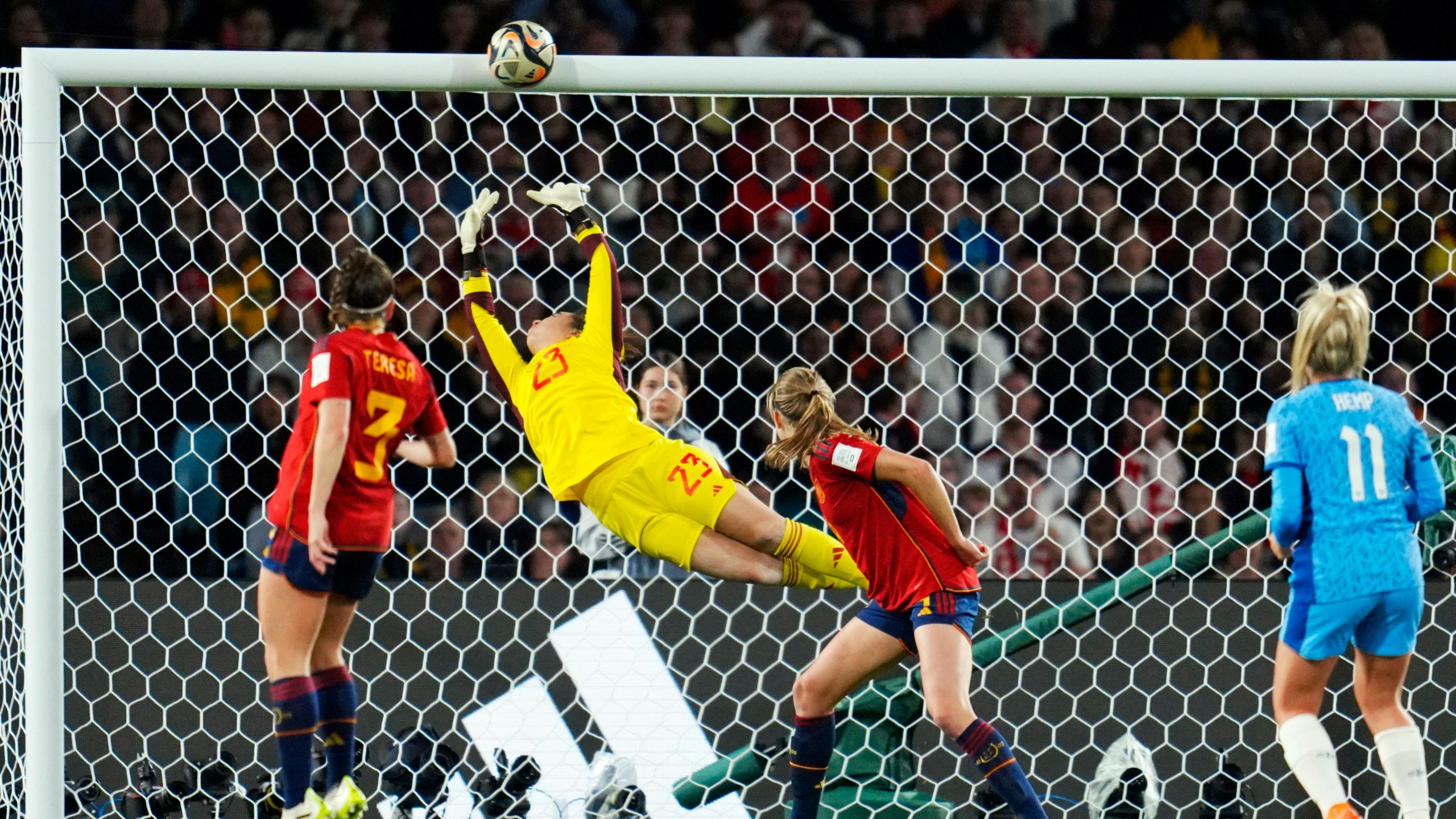 FILE - A shot from England's Lauren Hemp, right, hits the crossbar during the Women's World Cup soccer final between Spain and England at Stadium Australia in Sydney, Australia, Sunday, Aug. 20, 2023. The U.S. Soccer Federation and Mexico Football Federation submitted a joint bid to host the 2027 Women’s World Cup, competing against an expected proposal from Brazil and a joint Germany-Netherlands-Belgium plan. (AP Photo/Abbie Parr, File)