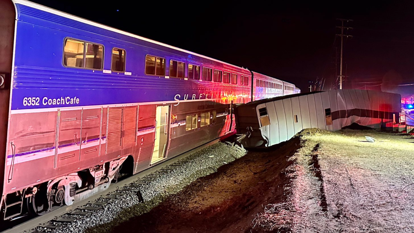 An Amtrak train and a semi-truck are seen following a crash in Ventura County.