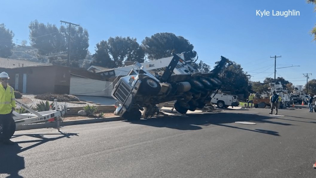 Toppled crane crushes portion of family's home