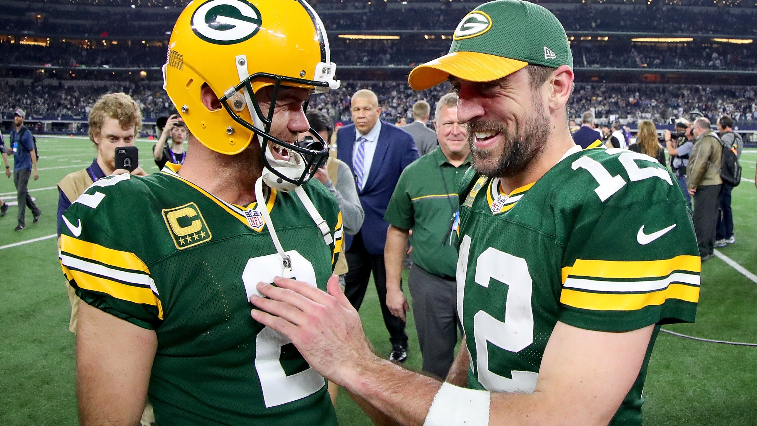 Mason Crosby #2 celebrates with Aaron Rodgers #12 of the Green Bay Packers after kicking the game-winning field goal against the Dallas Cowboys in the final seconds of a NFC Divisional Playoff game on January 15, 2017 in Arlington, Texas. (Getty Images)