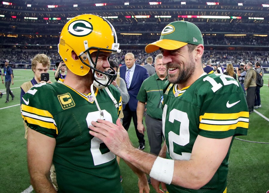 Mason Crosby #2 celebrates with Aaron Rodgers #12 of the Green Bay Packers after kicking the game-winning field goal against the Dallas Cowboys in the final seconds of a NFC Divisional Playoff game on January 15, 2017 in Arlington, Texas. (Getty Images)