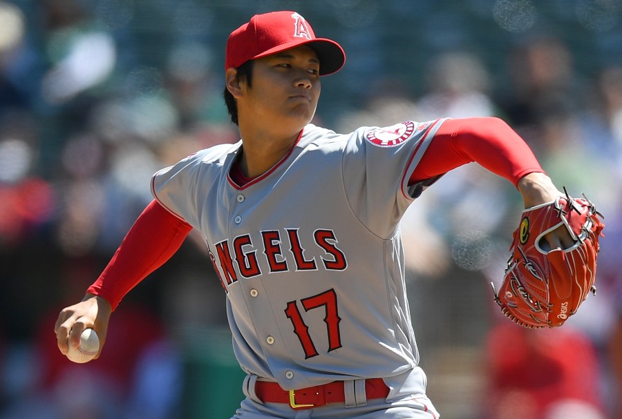 Shohei Ohtani #17 of the Los Angeles Angels of Anaheim pitches in the bottom of the first inning of his Major League pitching debut against the Oakland Athletics at Oakland Alameda Coliseum on April 1, 2018 in Oakland, California.  (Photo by Thearon W. Henderson/Getty Images)