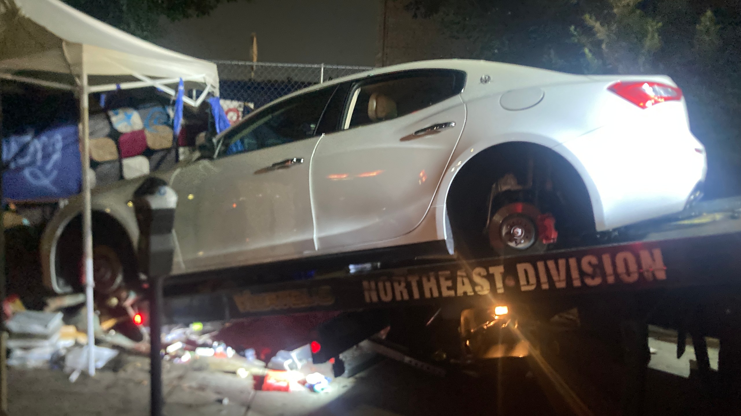 Three suspects were arrested after police found a stolen Maserati being stripped in downtown Los Angeles on Dec. 27, 2023. (Los Angeles Police Department)