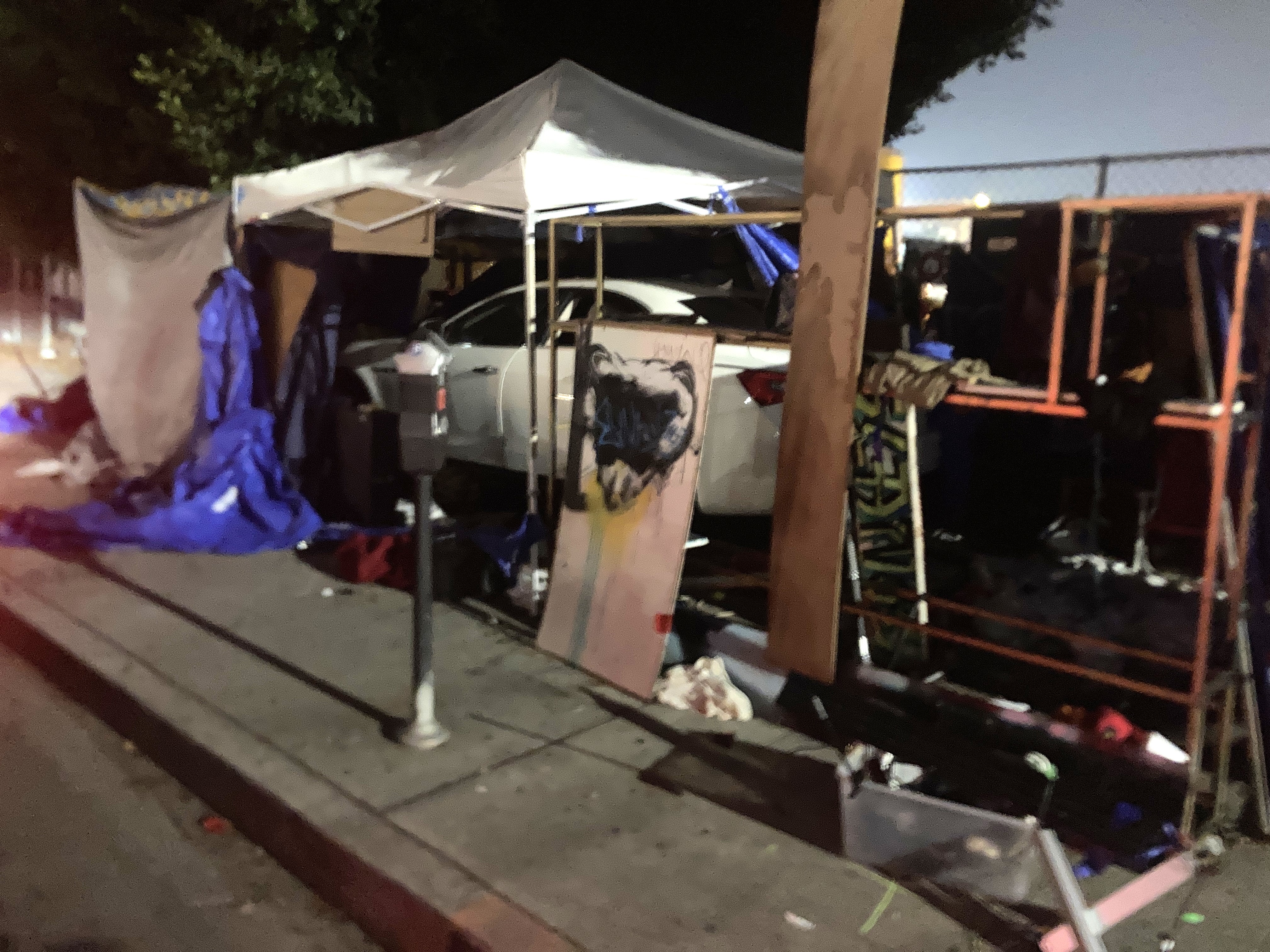 Three suspects were arrested after police found a stolen Maserati being stripped in downtown Los Angeles on Dec. 27, 2023. (Los Angeles Police Department)