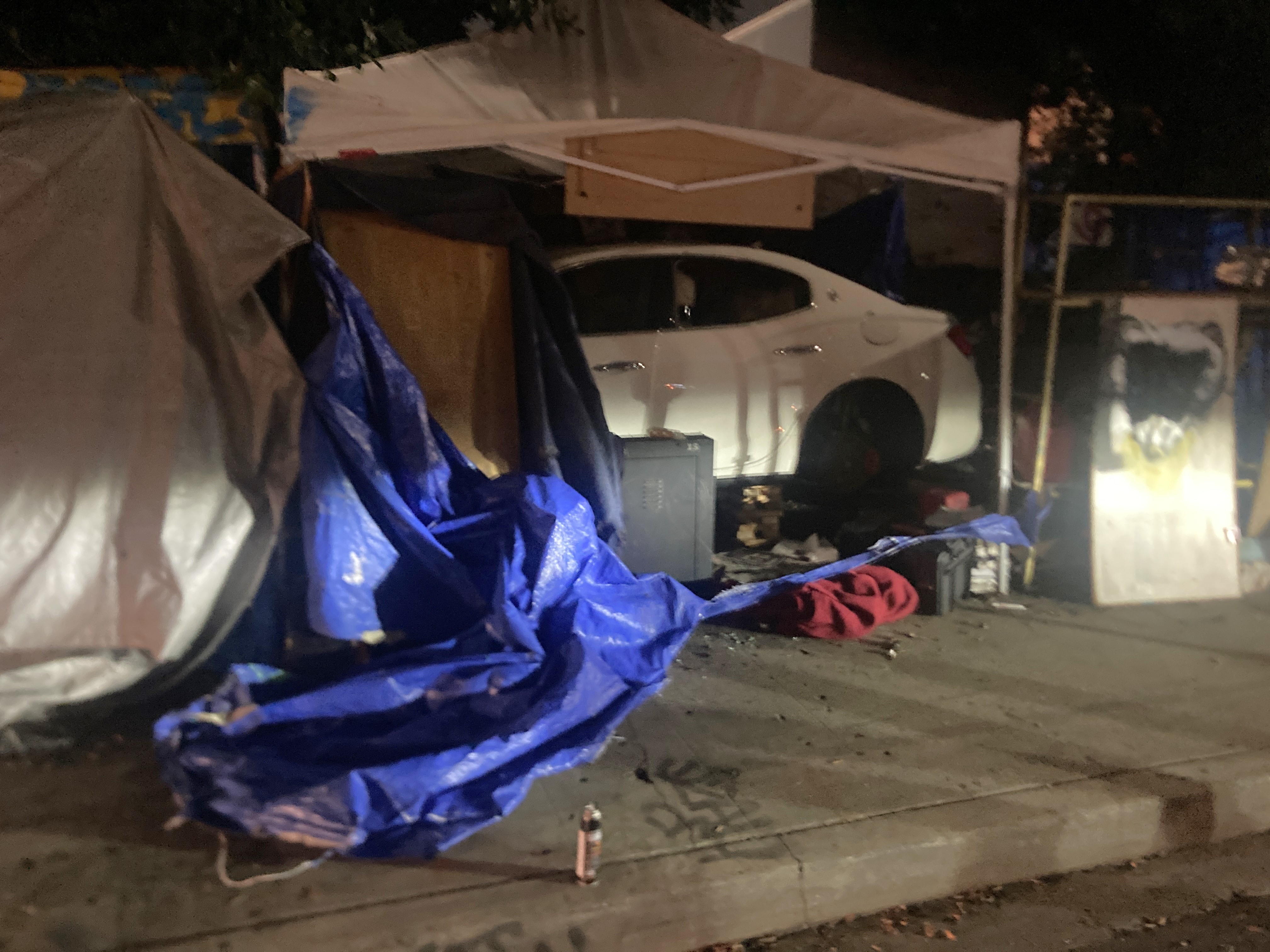 Three suspects were arrested after police found a stolen Maserati being stripped in downtown Los Angeles on Dec. 27, 2023. (Los Angeles Police Department)