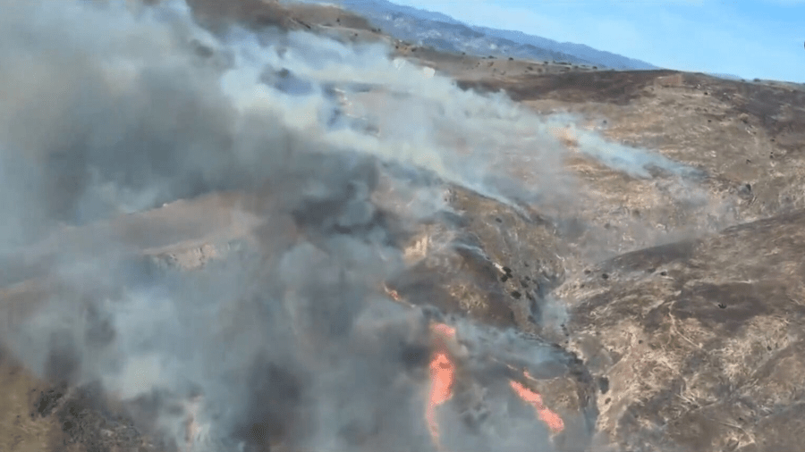 A brush fire burns in northern Ventura County on Dec. 9, 2023. (@VCAirUnit)