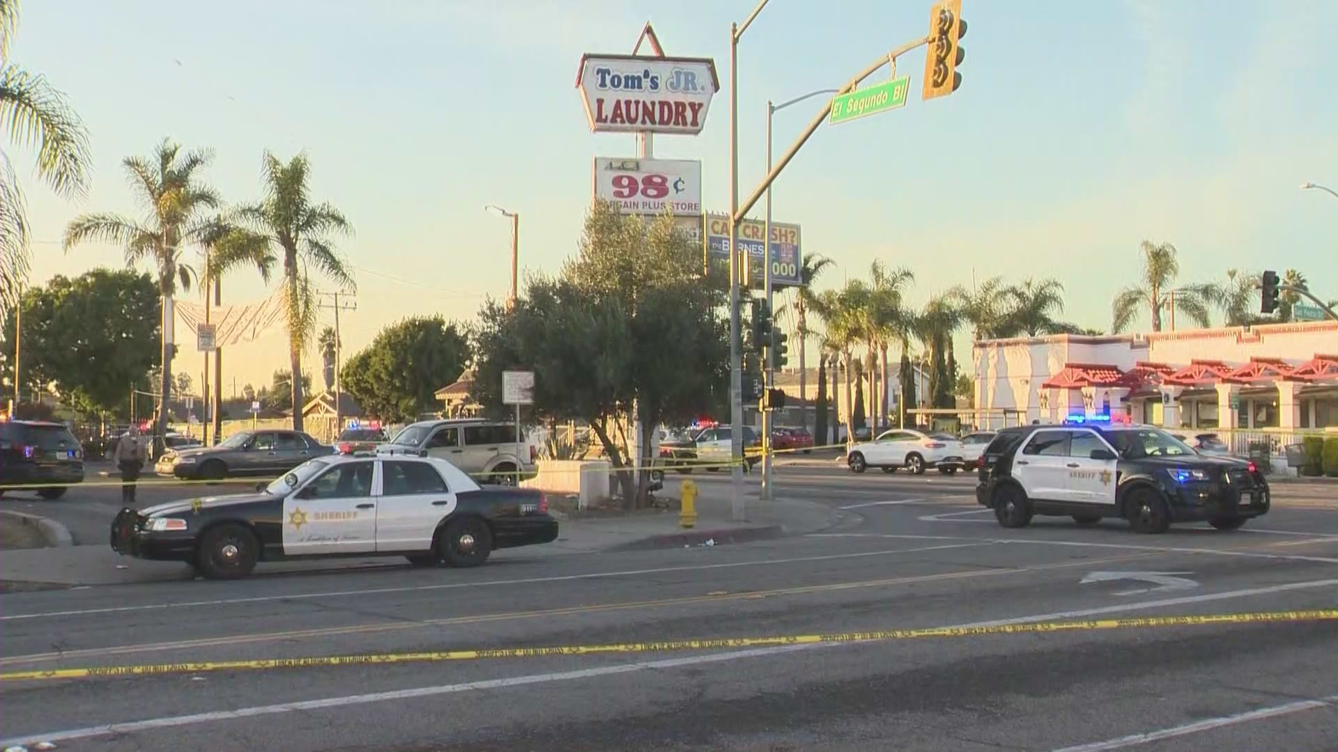 One person was killed and four others were hospitalized after shots rang out at a Willowbrook shopping plaza on Dec. 15, 2023. (KTLA)