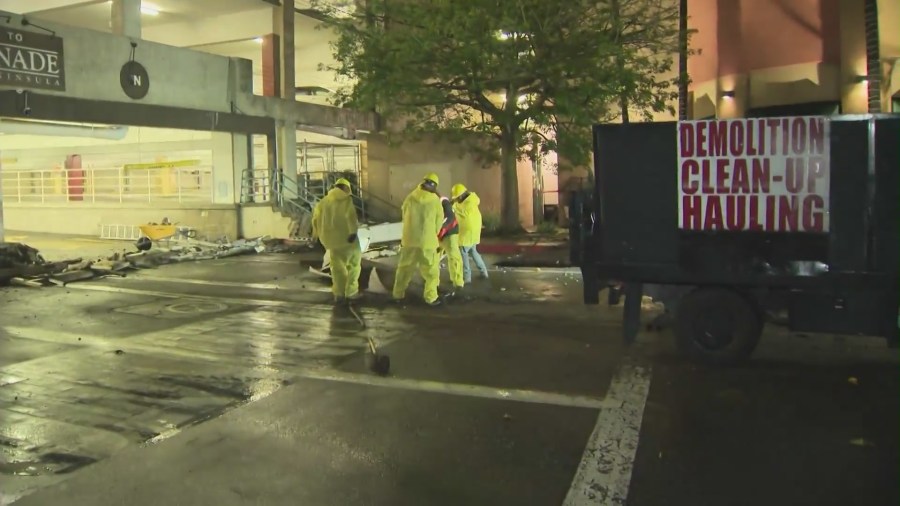 Large concrete planter boxes came crashing down at a shopping mall in Rolling Hills Estates due to heavy rain on Dec. 20, 2023. (KTLA)