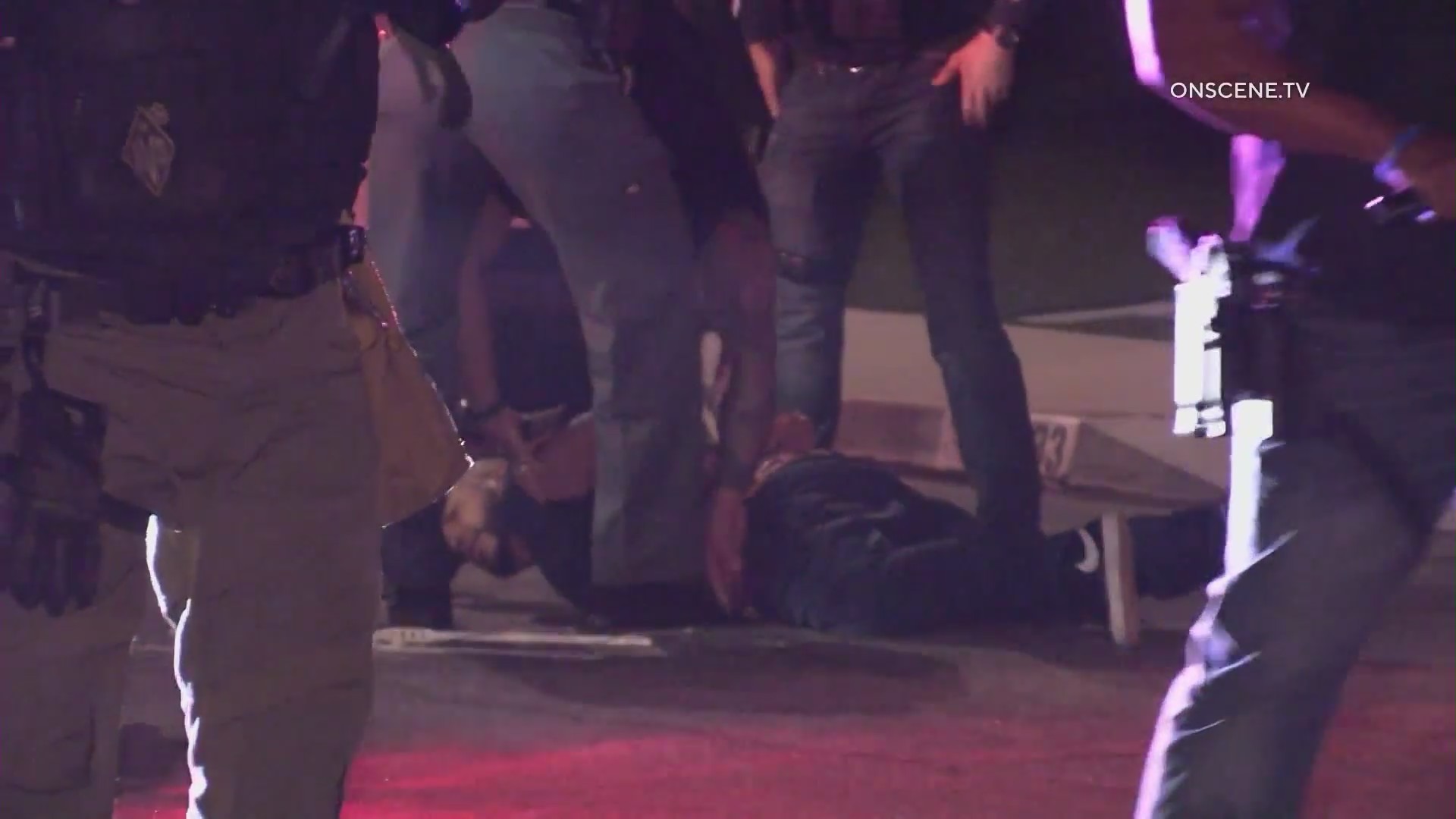 Activists being arrested after protesting outside the Fontana mayor’s house. (OnScene.TV)