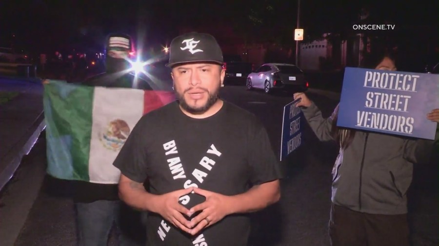 Edin Alex Enamorado, a well-known SoCal street vendor activist, seen protesting outside the Fontana mayor’s house. (OnScene.TV)