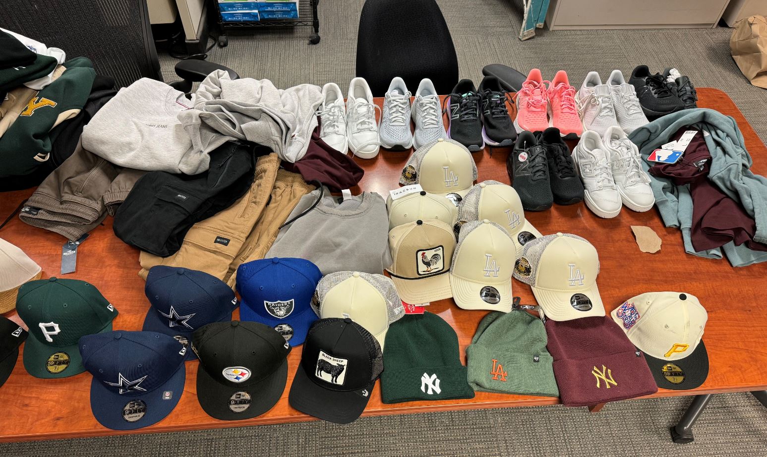 An estimated $5,000 worth of stolen merchandise from the Camarillo Premium Outlets was found after a pursuit arrest in Camarillo on Nov. 27, 2023. (Ventura County Sheriff's Office)