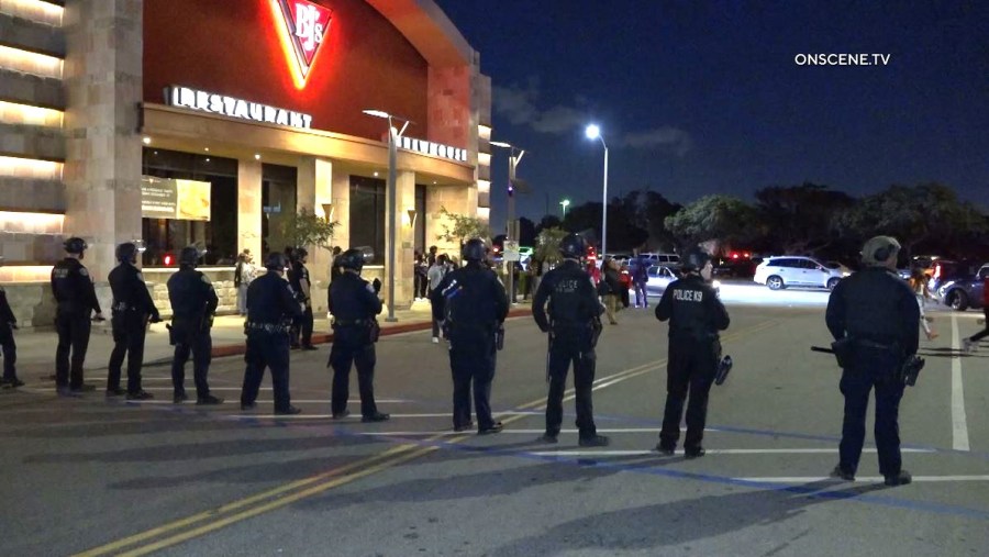 A disturbance involving a large crowd of juveniles shut down streets around the Del Amo Fashion Center in Torrance on Dec. 30, 2023. (OnScene.TV)