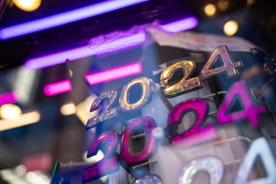 2024 glasses are displayed ahead of New Year's Eve in Times Square, Friday, Dec. 29, 2023, in New York. (AP Photo/Yuki Iwamura)