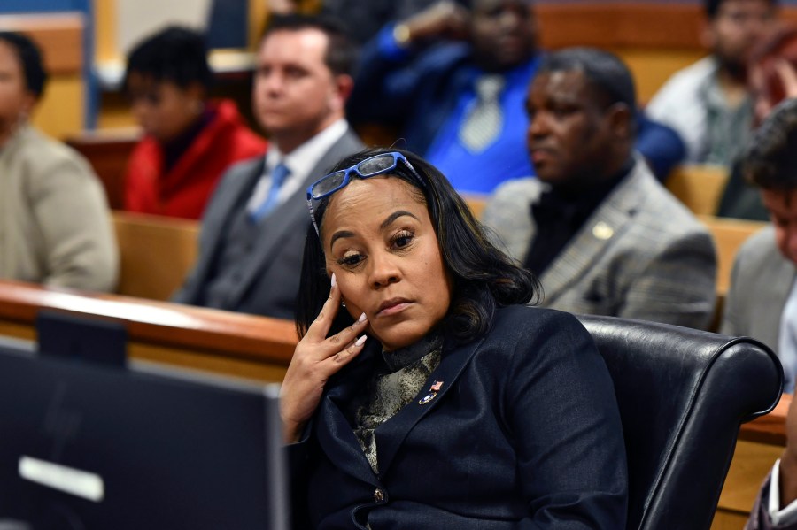 FILE - Fulton County District Attorney Fani Willis appears during a hearing regarding defendant Harrison Floyd, a leader in the organization Black Voices for Trump, as part of the Georgia election indictments, Nov. 21, 2023, in Atlanta. Accusations that Fulton County District Attorney Fani Willis had an inappropriate relationship with a special prosecutor she hired to seek convictions of Donald Trump and others for interfering in Georgia's 2020 election have led to renewed calls to remove Willis from the case. (Dennis Byron/Hip Hop Enquirer via AP)