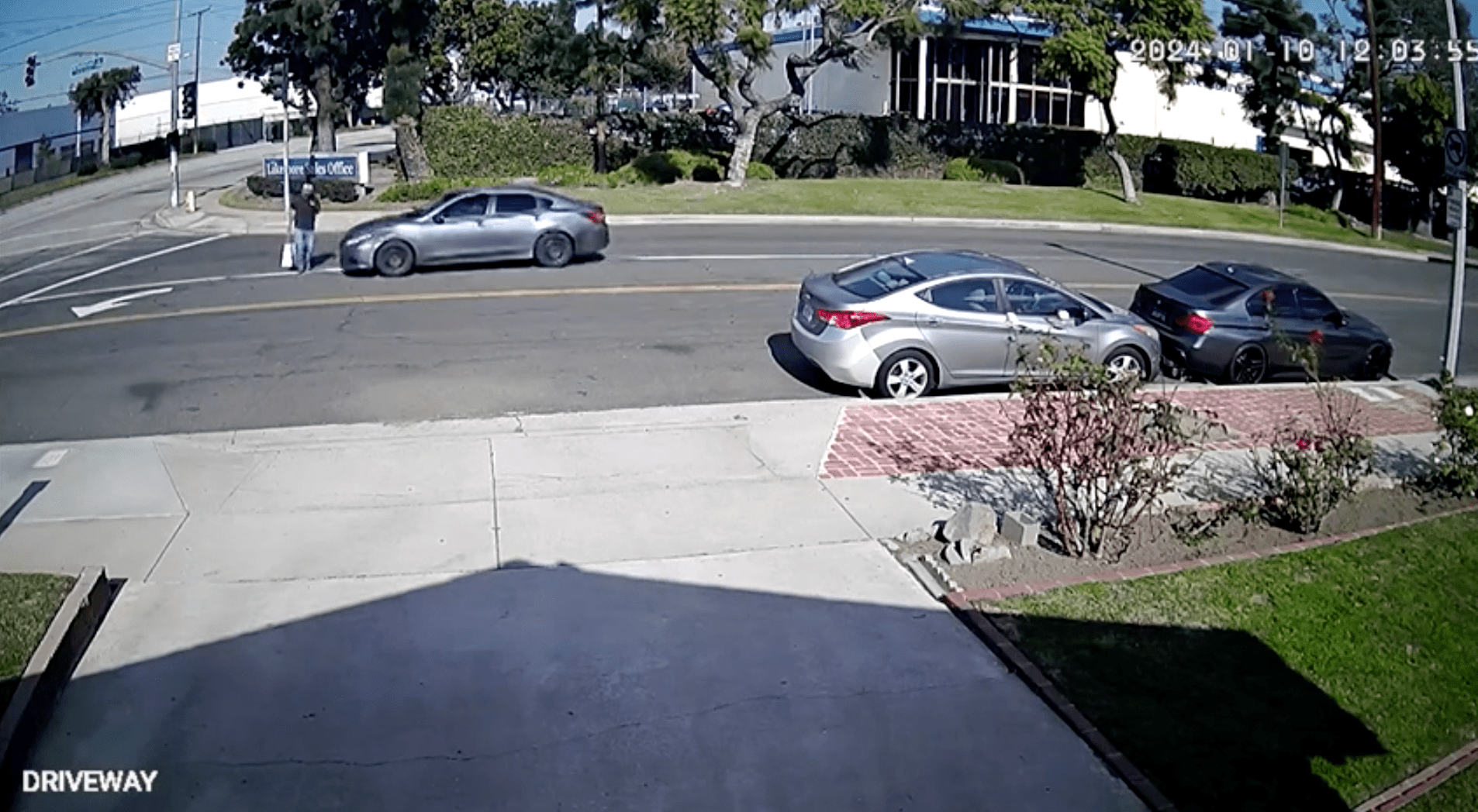 A gray four-door vehicle with prior damage to the right passenger side of the vehicle seen here on Jan. 10, 2024, moments before hitting the victim.