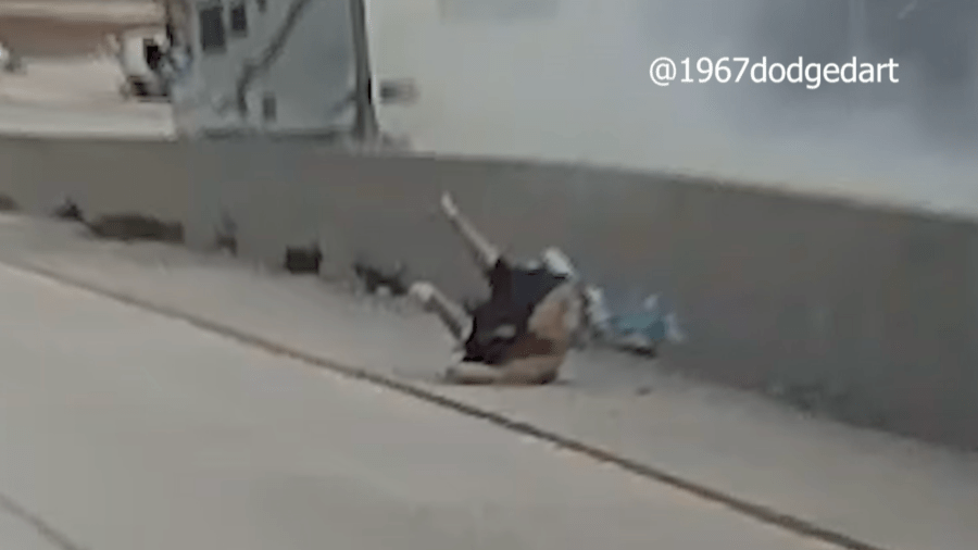 A man is seen on the 14 Freeway after an RV hit the center divider on Jan. 15, 2024.