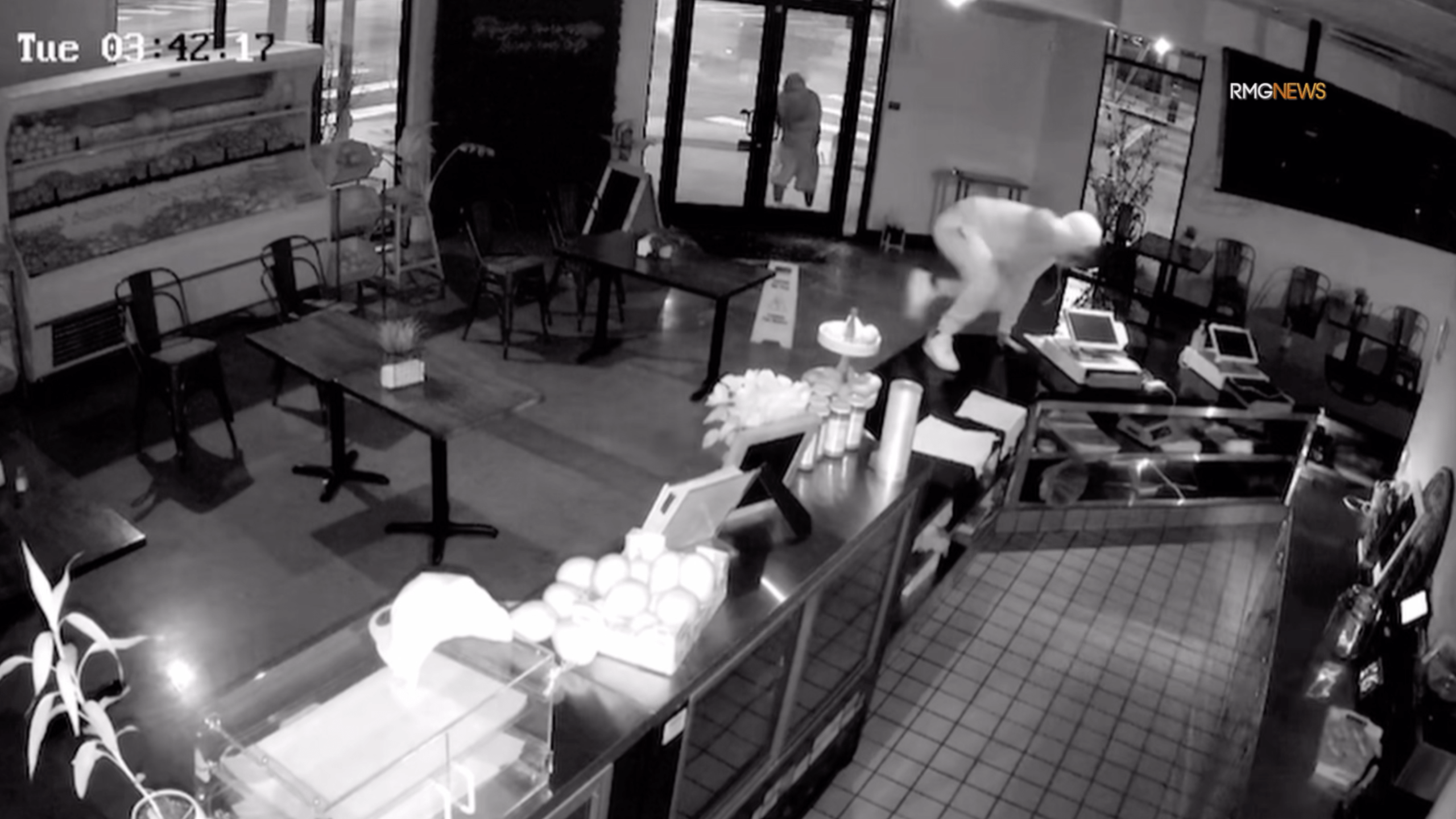 Thieves are seen entering a restaurant in Sylmar on Jan. 16, 2024.