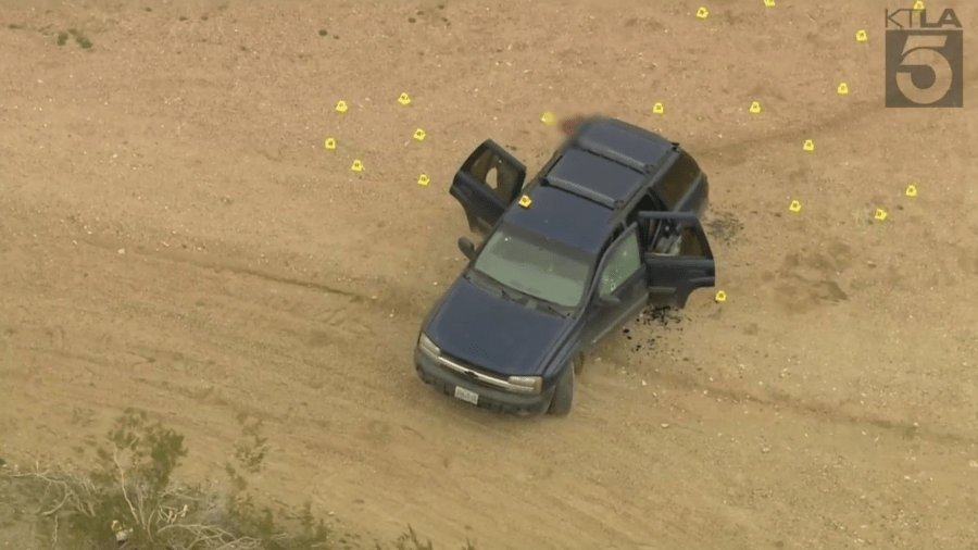 This aerial image from Sky5 taken on Jan. 24, 2024, shows evidence markers where several people were found shot to death in El Mirage. (KTLA)