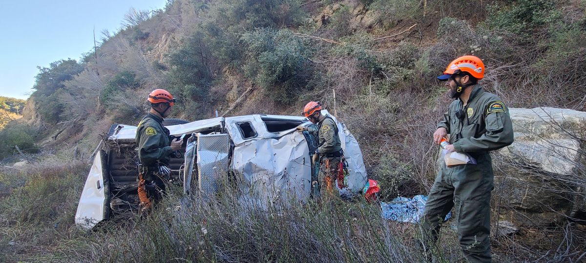 A woman was rescued after driving off a road and tumbling down a canyon in the San Gabriel Mountains on Jan. 7, 2024. (San Dimas Mountain Rescue Team)