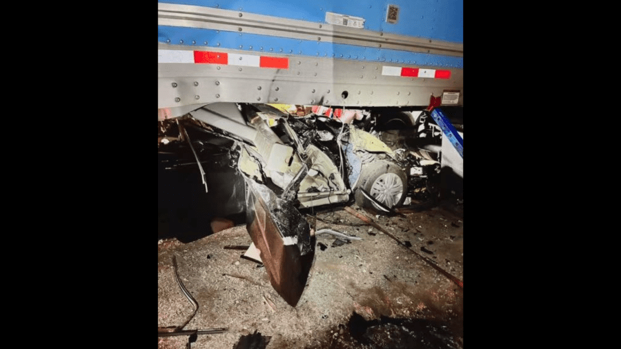 One person was hospitalized after a vehicle was found crushed under a semi-truck on the 10 Freeway in Redlands freeway on Jan. 6, 2024. (Redlands Fire Department)