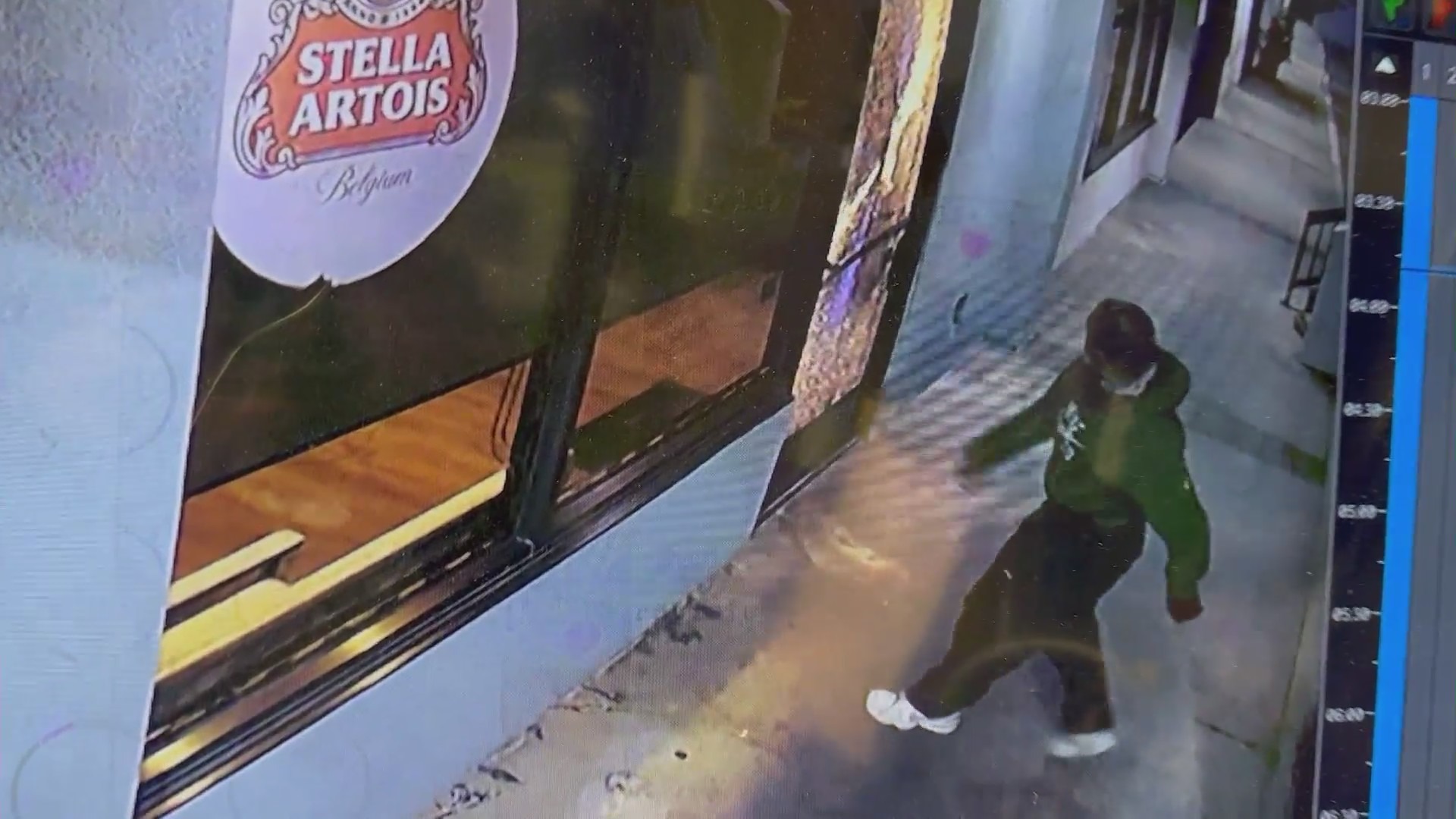 A suspect wanted for smashing glass windows and doors in a series of possible hate crimes targeting stores in the San Fernando Valley in January 2024.