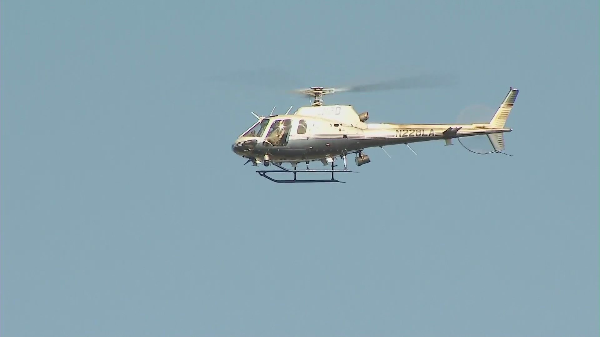 Police swarm a Beverly Crest mansion that squatters have turned into a party house after reports of a burglary on Jan. 26, 2024. (KTLA)