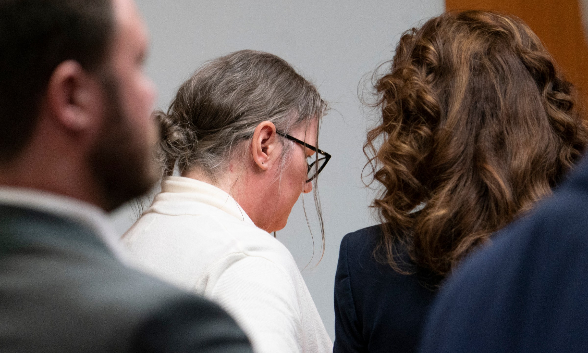 Jennifer Crumbley looks on after she was found guilty on four counts of involuntary manslaughter in the Oakland County courtroom of Cheryl Matthews on Tuesday, Feb. 6, 2024 in Pontiac, Mich. Prosecutors say Crumbley was grossly negligent when she failed to tell Oxford High School that the family had guns, including a 9 mm handgun that her son, Ethan Crumbley, used at a shooting range on the weekend before the Nov. 30, 2021, attack. (Mandi Wright/Detroit Free Press via AP, Pool)