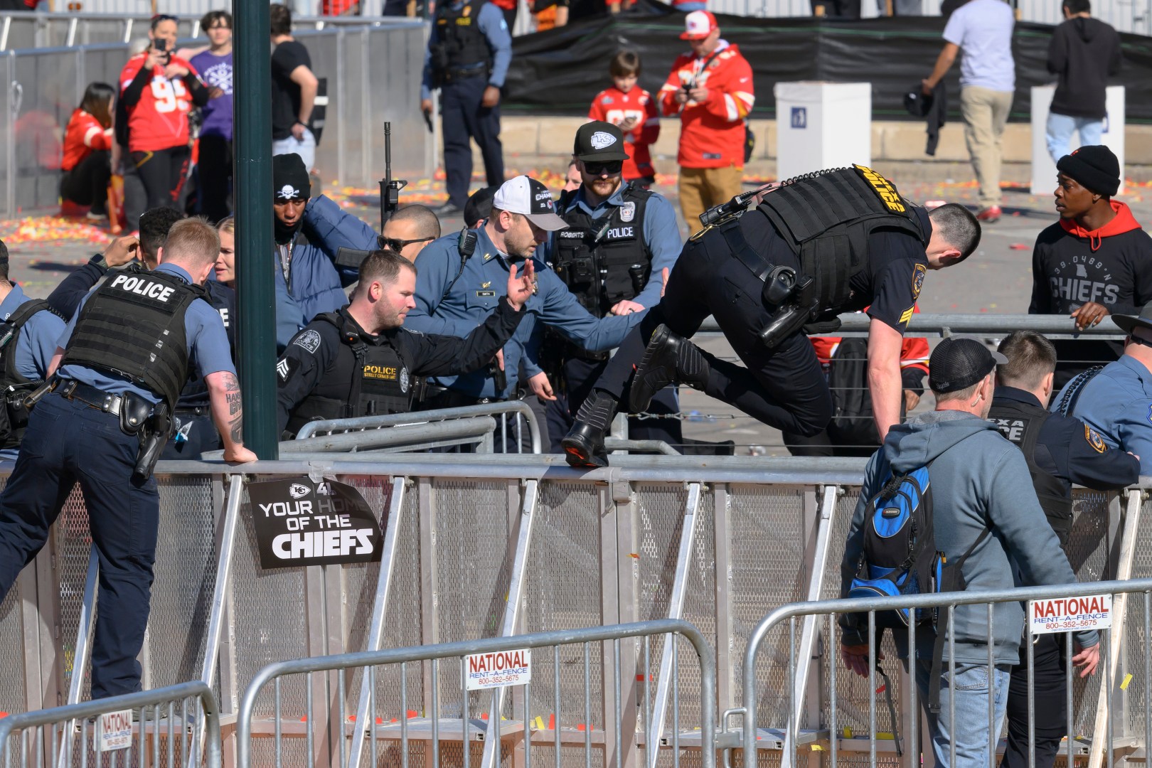 Law enforcement personnel clear the area around Union Station following a shooting at the Kansas City Chiefs NFL football Super Bowl celebration in Kansas City, Mo., Wednesday, Feb. 14, 2024.