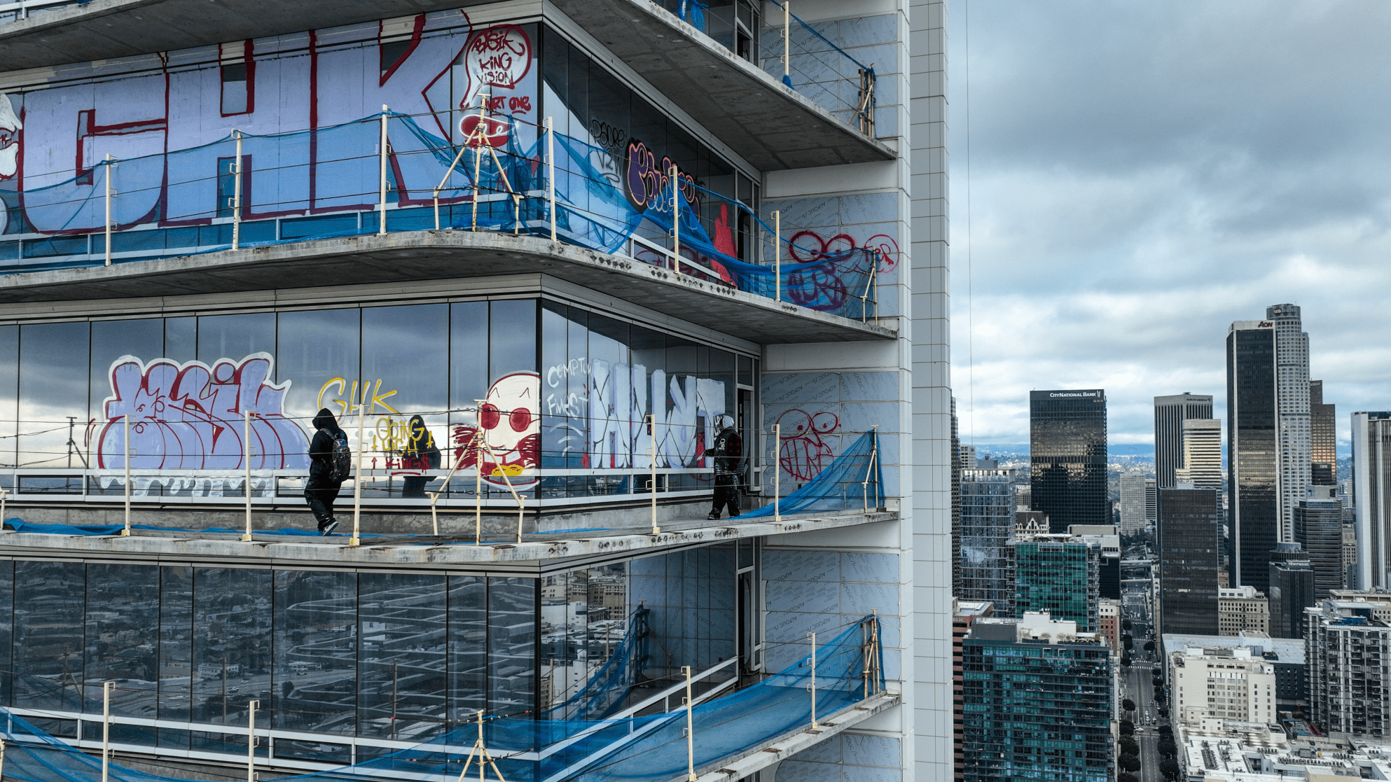 Taggers have graffitied what appears to be more than 25 stories of a downtown Los Angeles skyscraper that's been sitting dormant for several years.