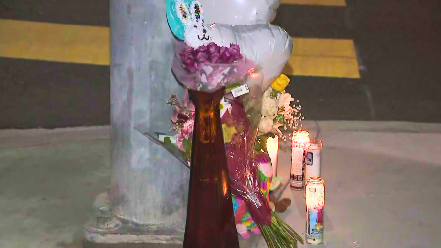 A growing memorial is seen at the site of a fatal hit-and-run crash that took place in Gardena on Feb. 11, 2023.