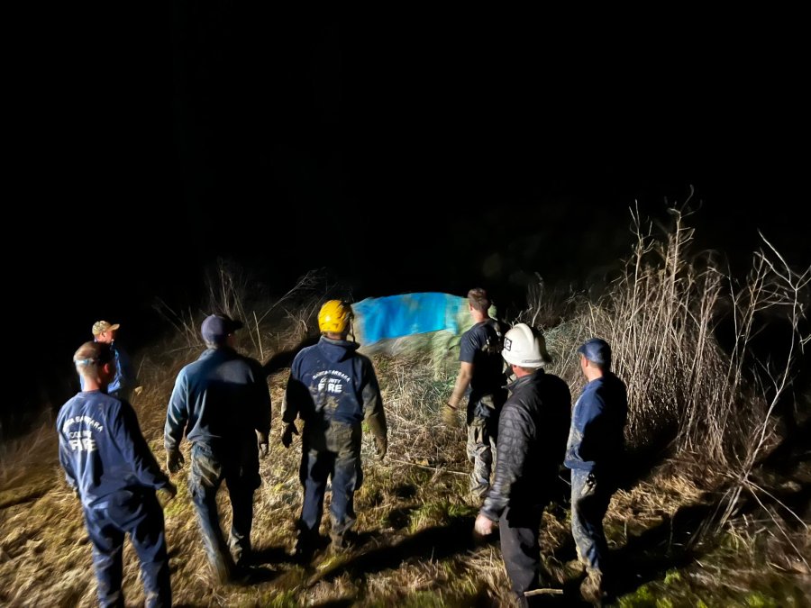 A cow is seen resting under a blanket after being rescued in this image provided by Santa Barbara County Fire.